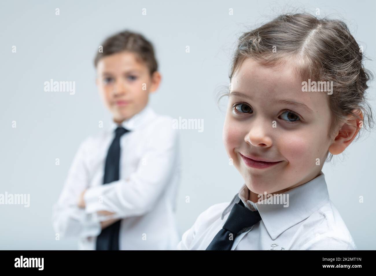 Pretty little girl with lovely warm friendly smile Stock Photo