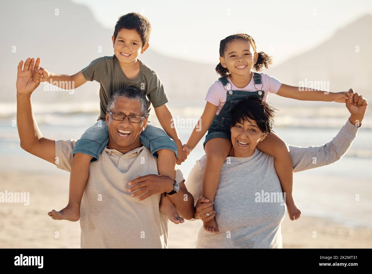 Grandparents, kids and family portrait at beach holiday, summer