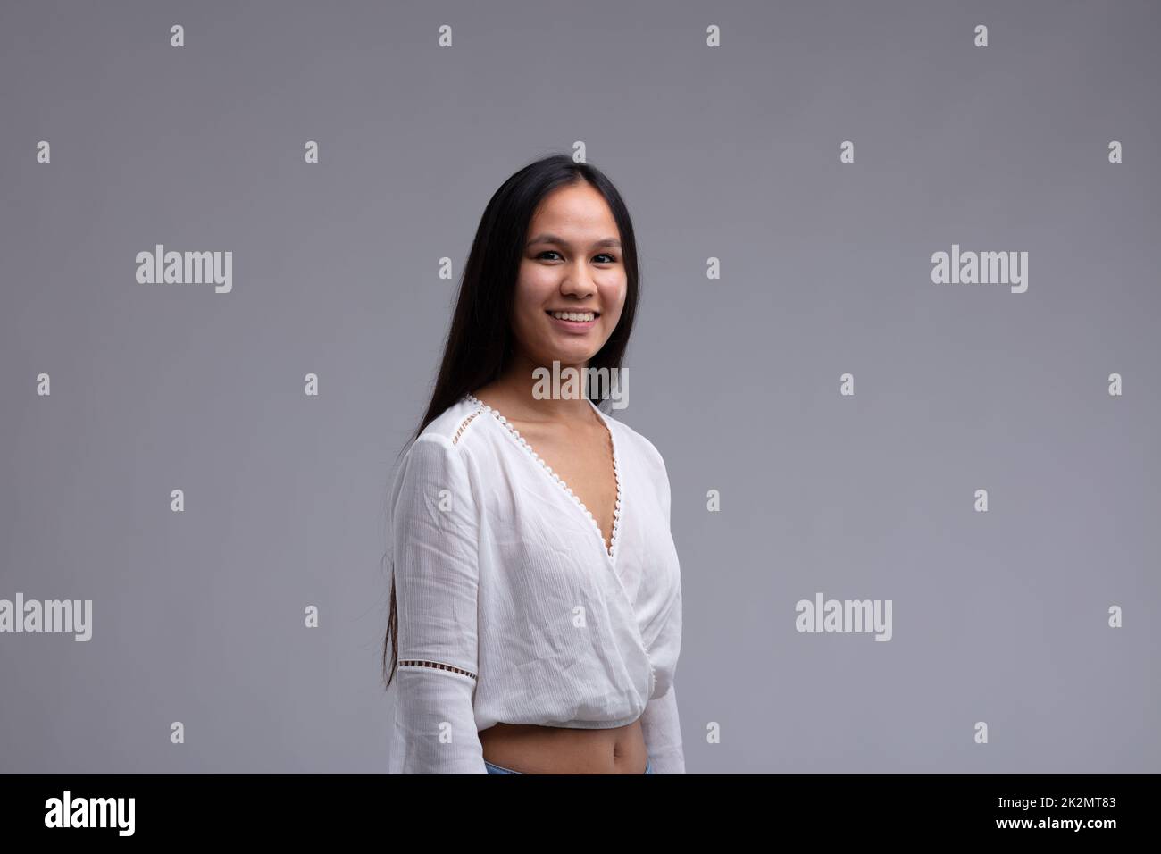 Beautiful girl in black leggings and a t-shirt, happy face, long hair, a  smile on his face, dancing Stock Photo by ©VladimirDrozdin 59724665