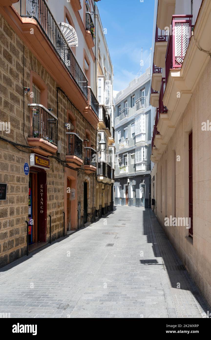 An old narrow street in the old city of Cadiz Spain Stock Photo