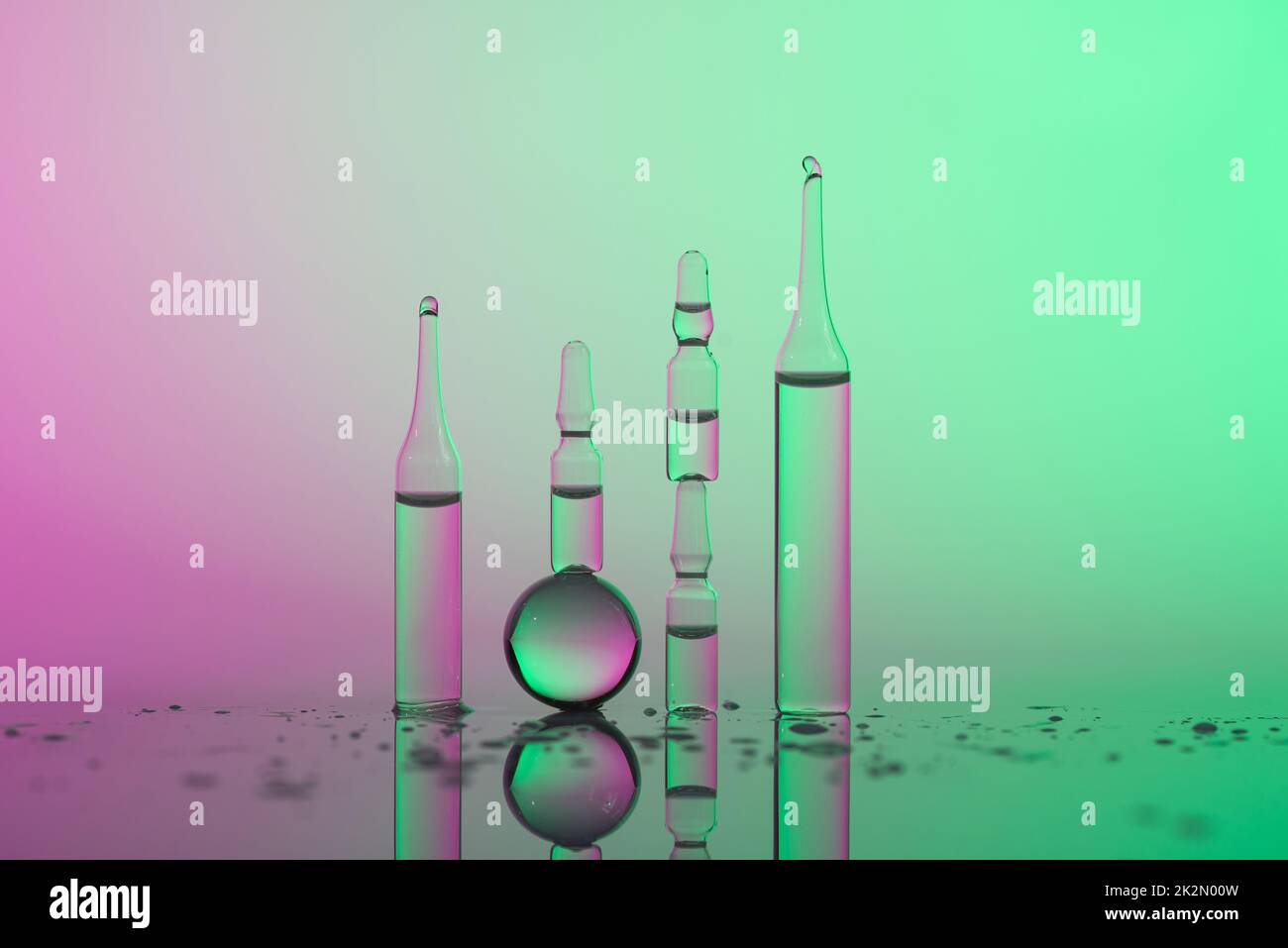 Glass ampules with serum or vitamins Stock Photo