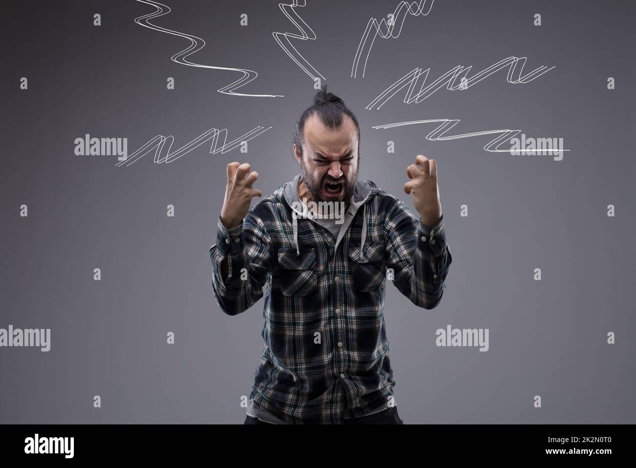 Man yelling and screaming with rage Stock Photo