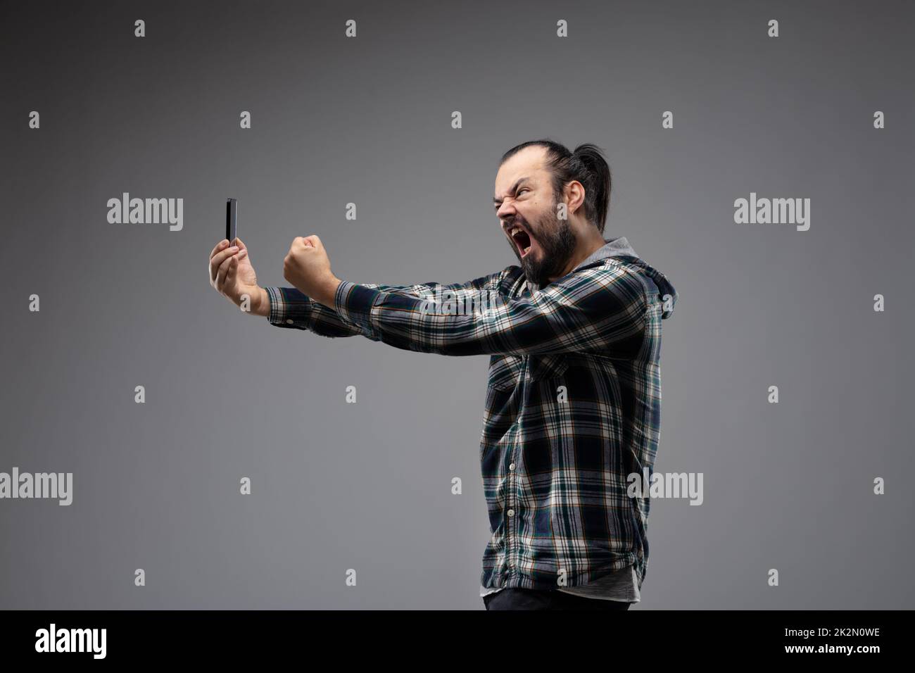 Threatening gestures hi-res stock photography and images - Alamy