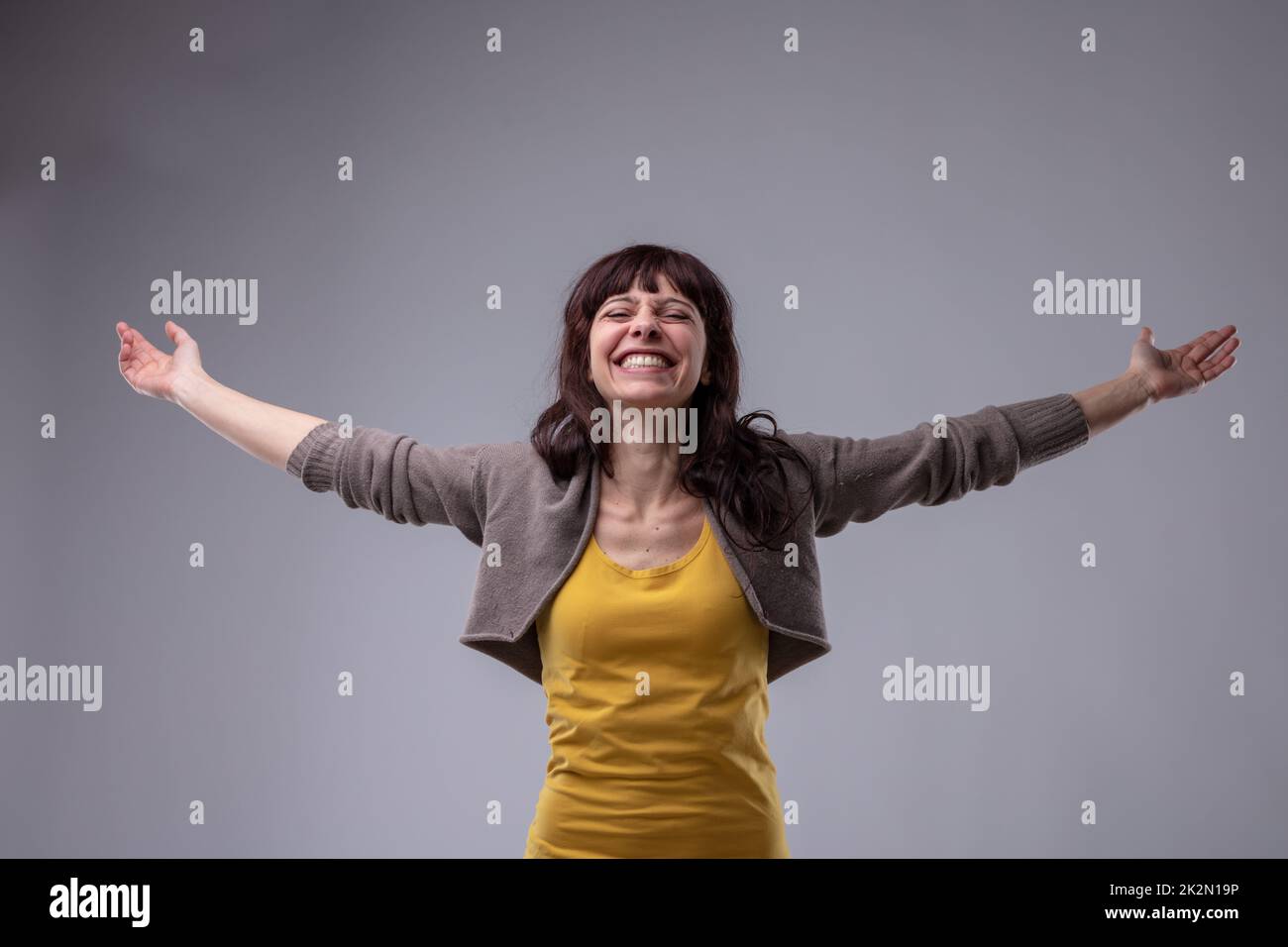 Happy elated woman celebrating Stock Photo