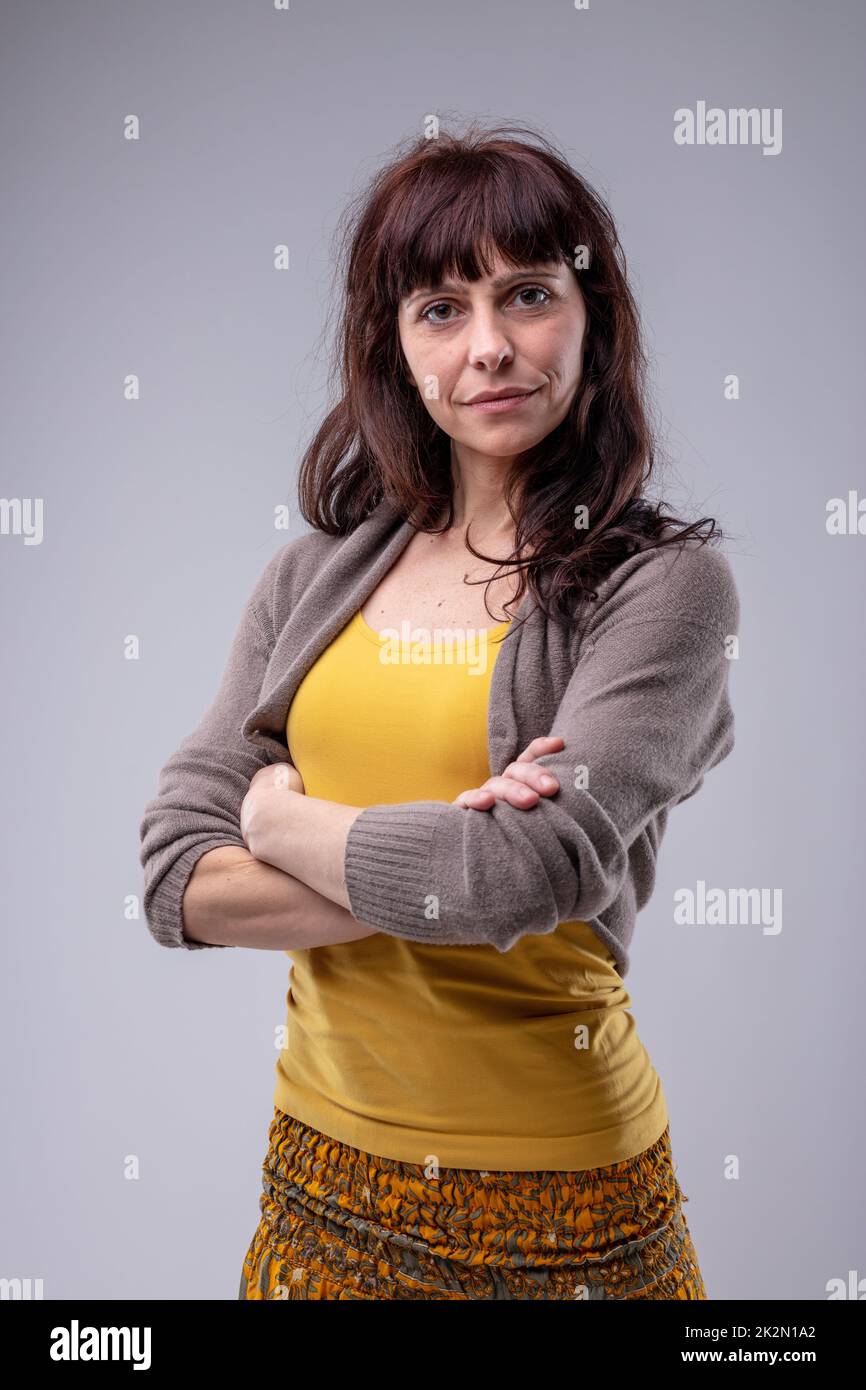 Woman with folded arms hi-res stock photography and images - Alamy