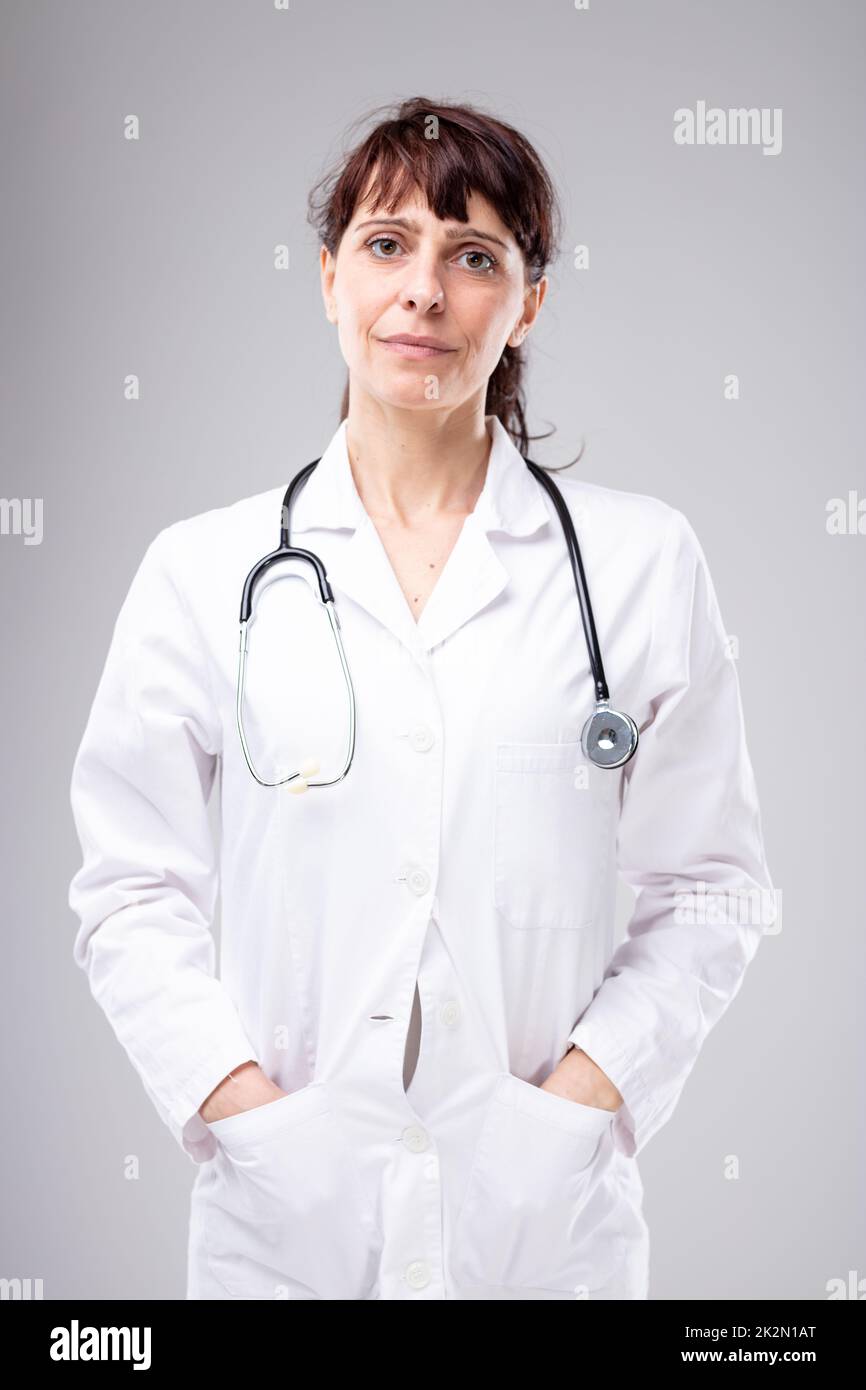 Compassionate female doctor or nurse Stock Photo