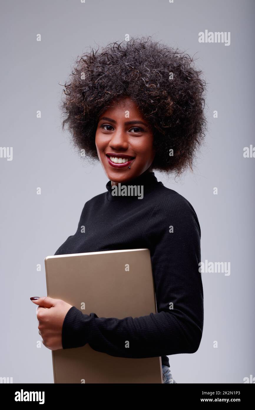 Attractive young Black woman with a lovely friendly smile Stock Photo