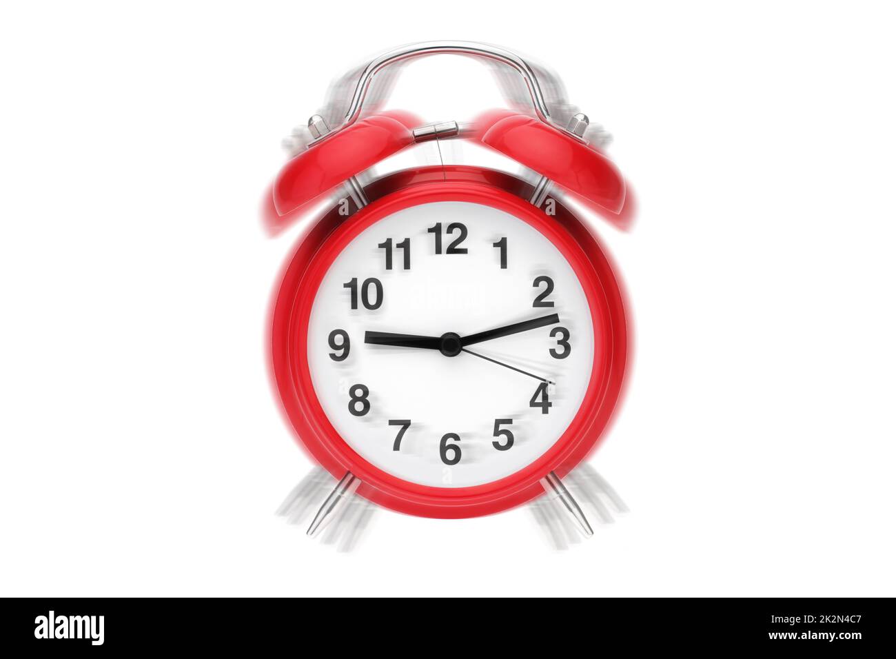 Ringing alarm clock. Red retro alarm clock on white with ringing effect Stock Photo