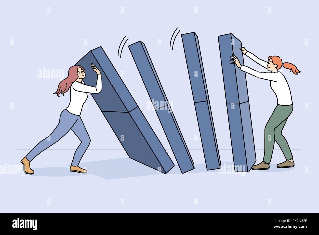 Businesswoman hold domino from falling down Stock Photo