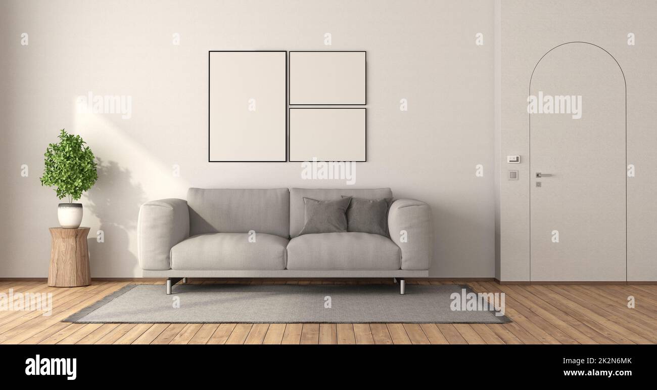 Poster mockup in a minimalist living room with frameless door Stock Photo