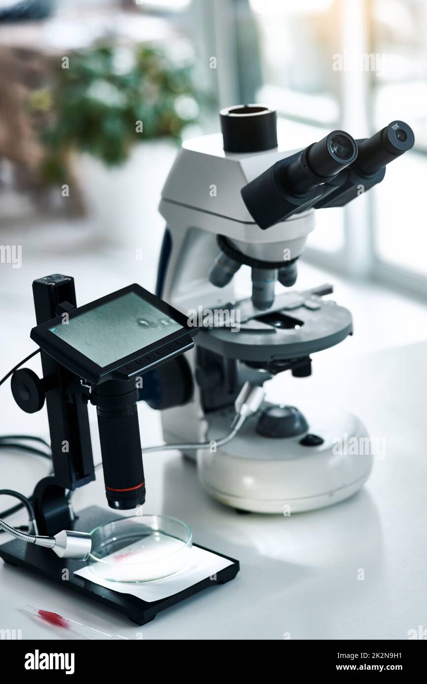 The equipment you need is ready. Still life shot of two microscopes placed in a laboratory. Stock Photo