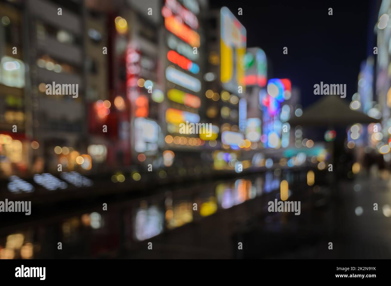 Abstract blur Illuminated billboards at night in Osaka, Japan Stock Photo