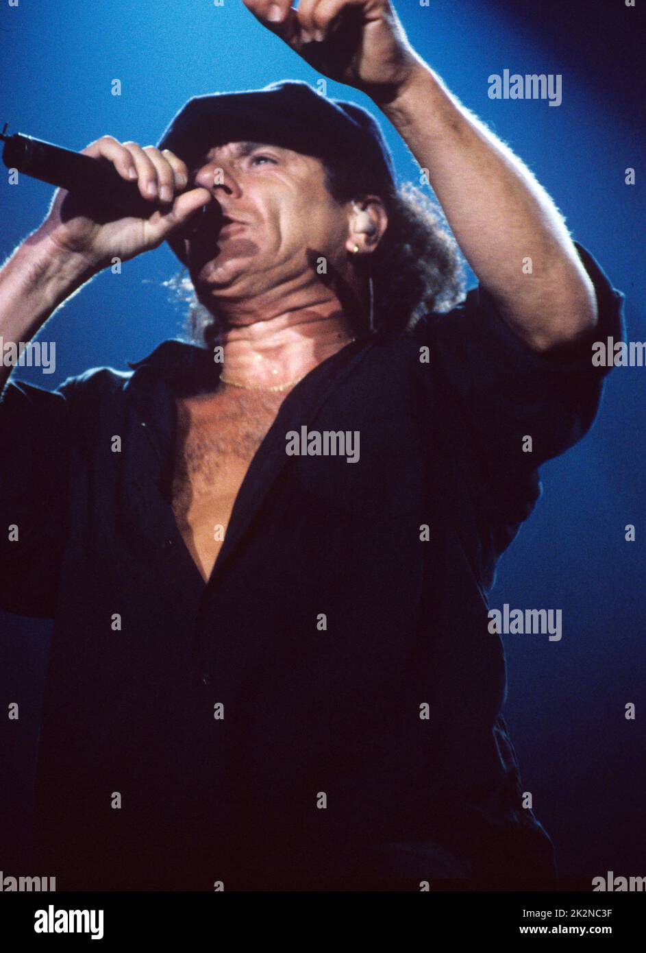 AC/DC ; Brian Johnson (vocals) ;  live at Wembley Arena, London, UK ;  June 1996 ;  Credit : Mel Longhurst / Performing Arts Images ;   www.performingartsimages.com Stock Photo