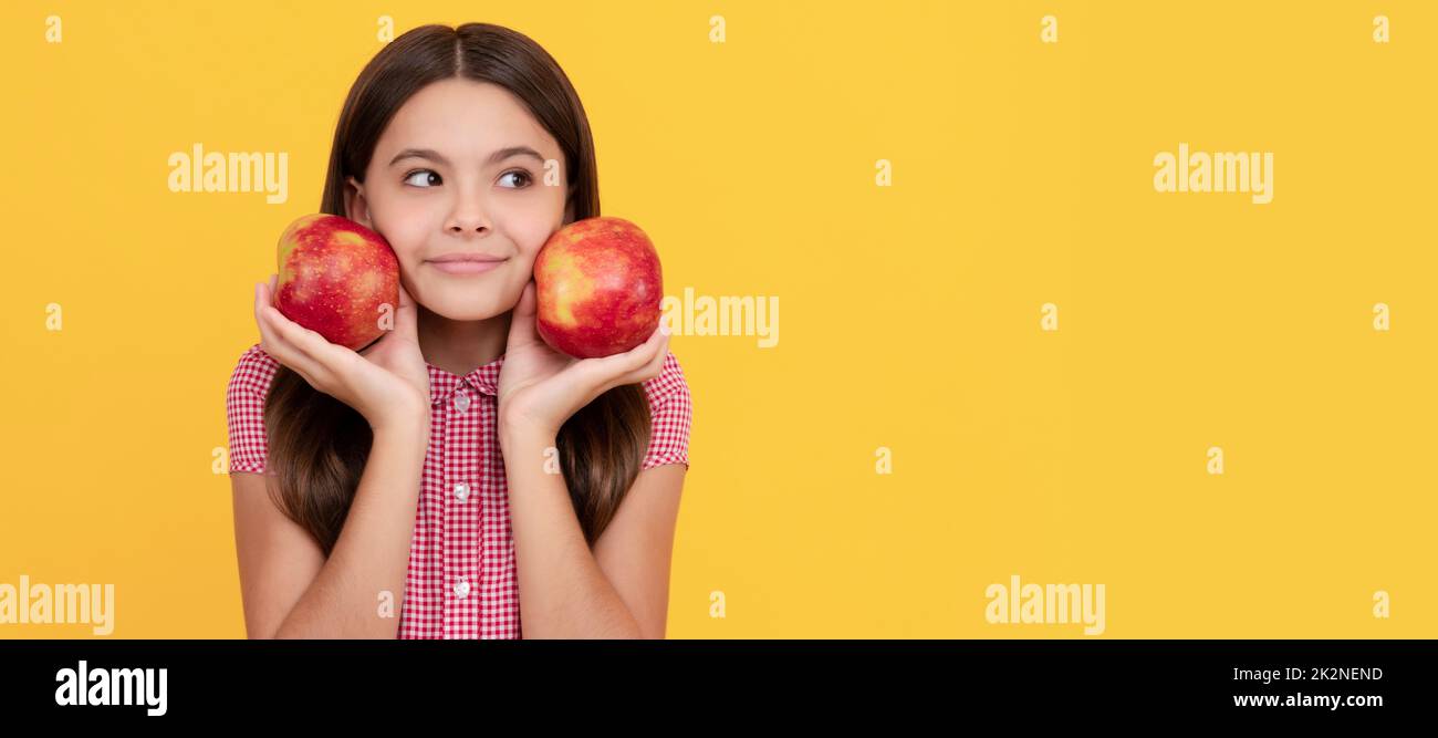 childhood health. natural organic fresh apple. healthy life. diet and kid beauty. Child girl portrait with apple, horizontal poster. Banner header Stock Photo