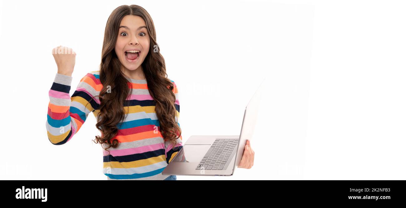 pass the exam. back to school. modern communication. check email. happy child study online. School girl portrait with laptop, horizontal poster Stock Photo