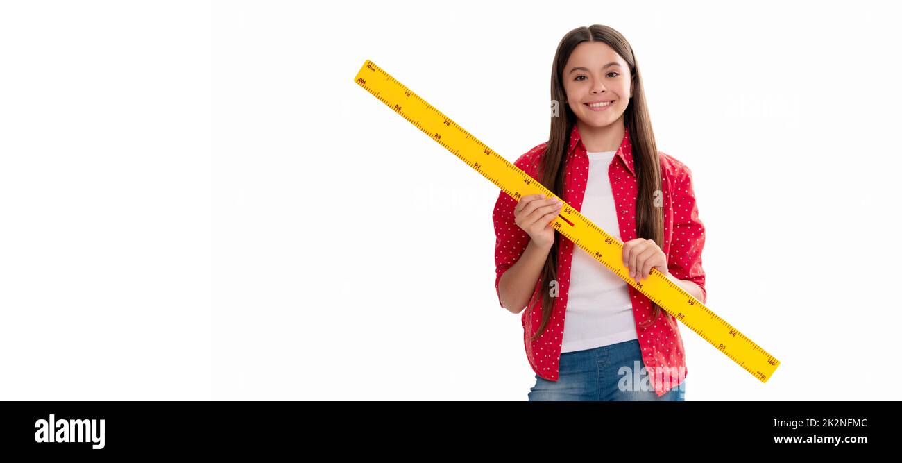 happy child hold ruler study mathematics at school isolated on white, back to school. Banner of schoolgirl student. School child pupil portrait with Stock Photo