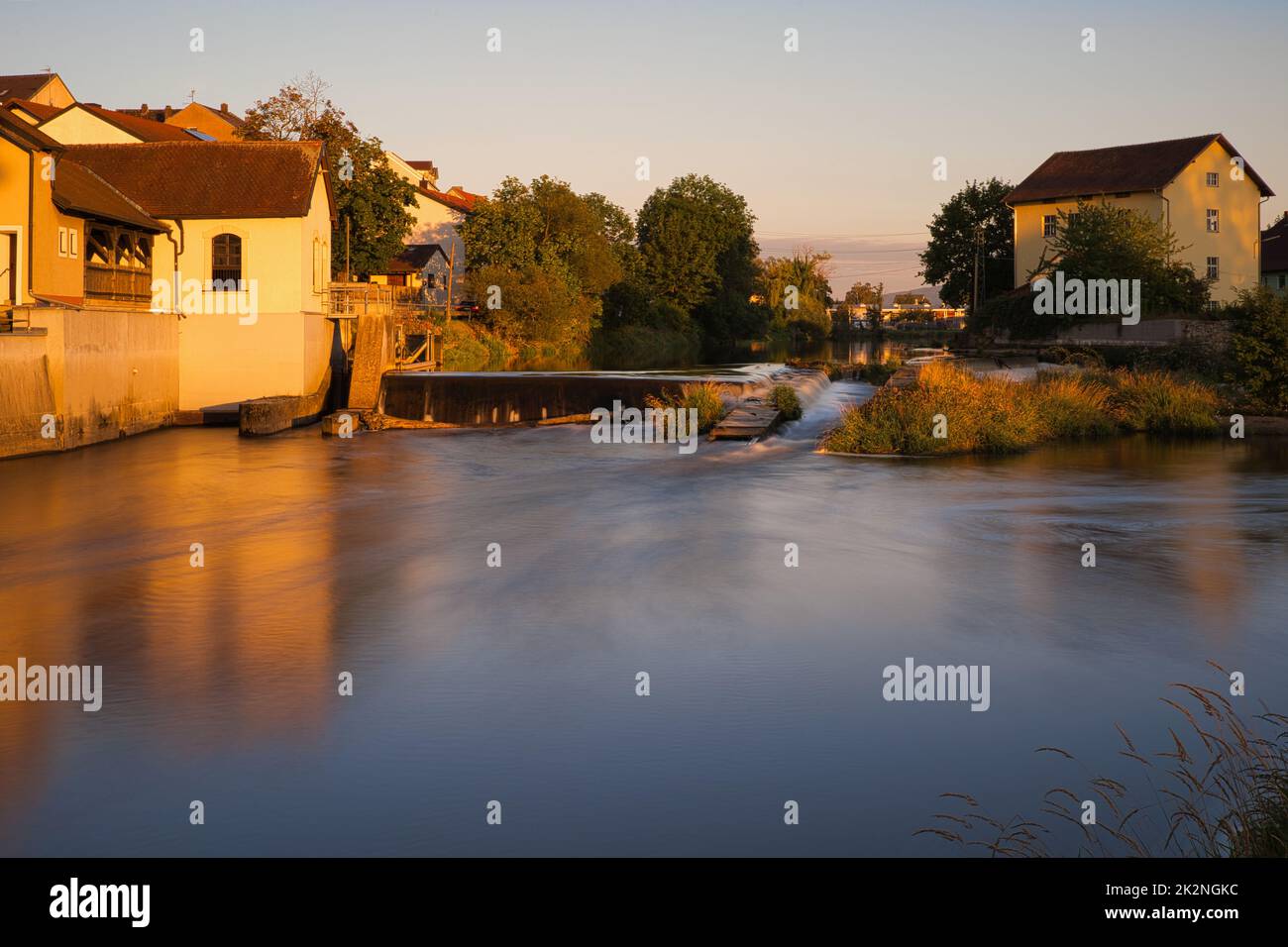 River Regen in Cham, a town in the Upper Palatinate, Bavaria, Germany. Golden hour Stock Photo