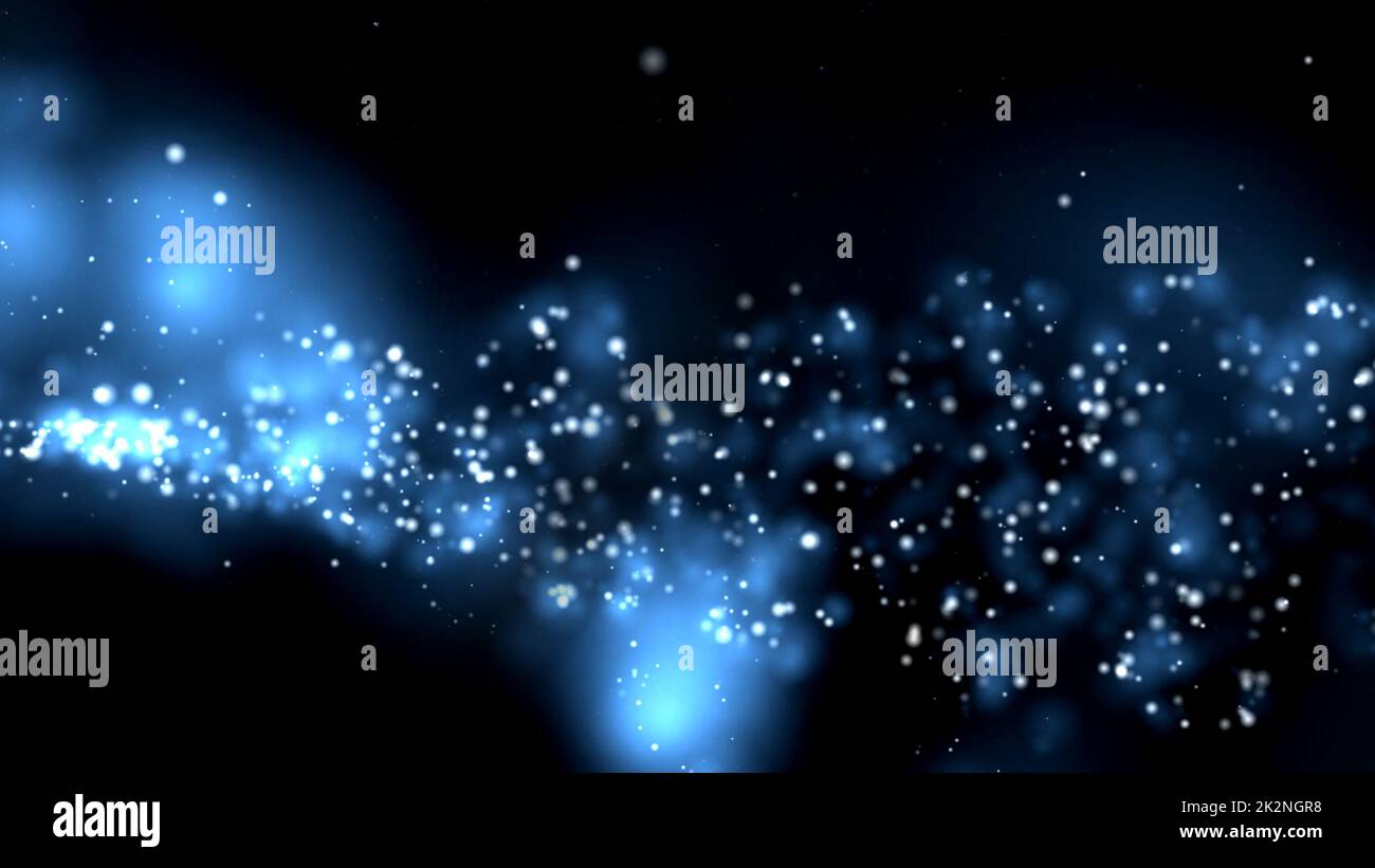 Blue dust particles floating over black Stock Photo - Alamy