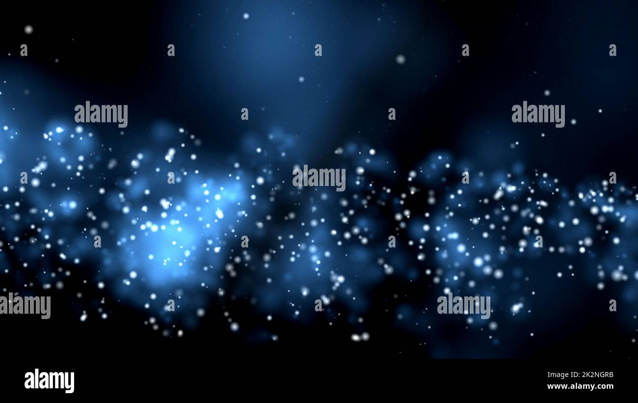 Blue dust particles floating over black Stock Photo - Alamy