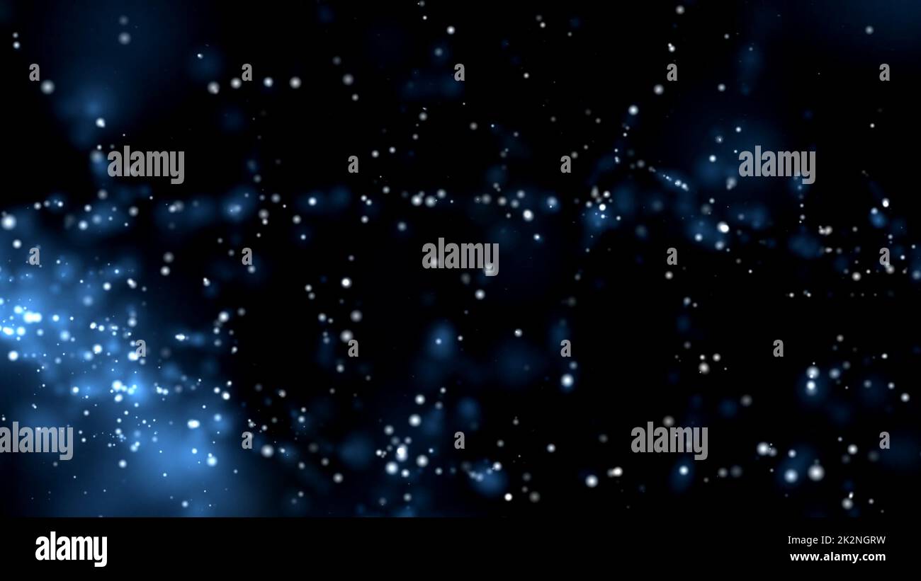 Blue dust particles floating over black Stock Photo - Alamy
