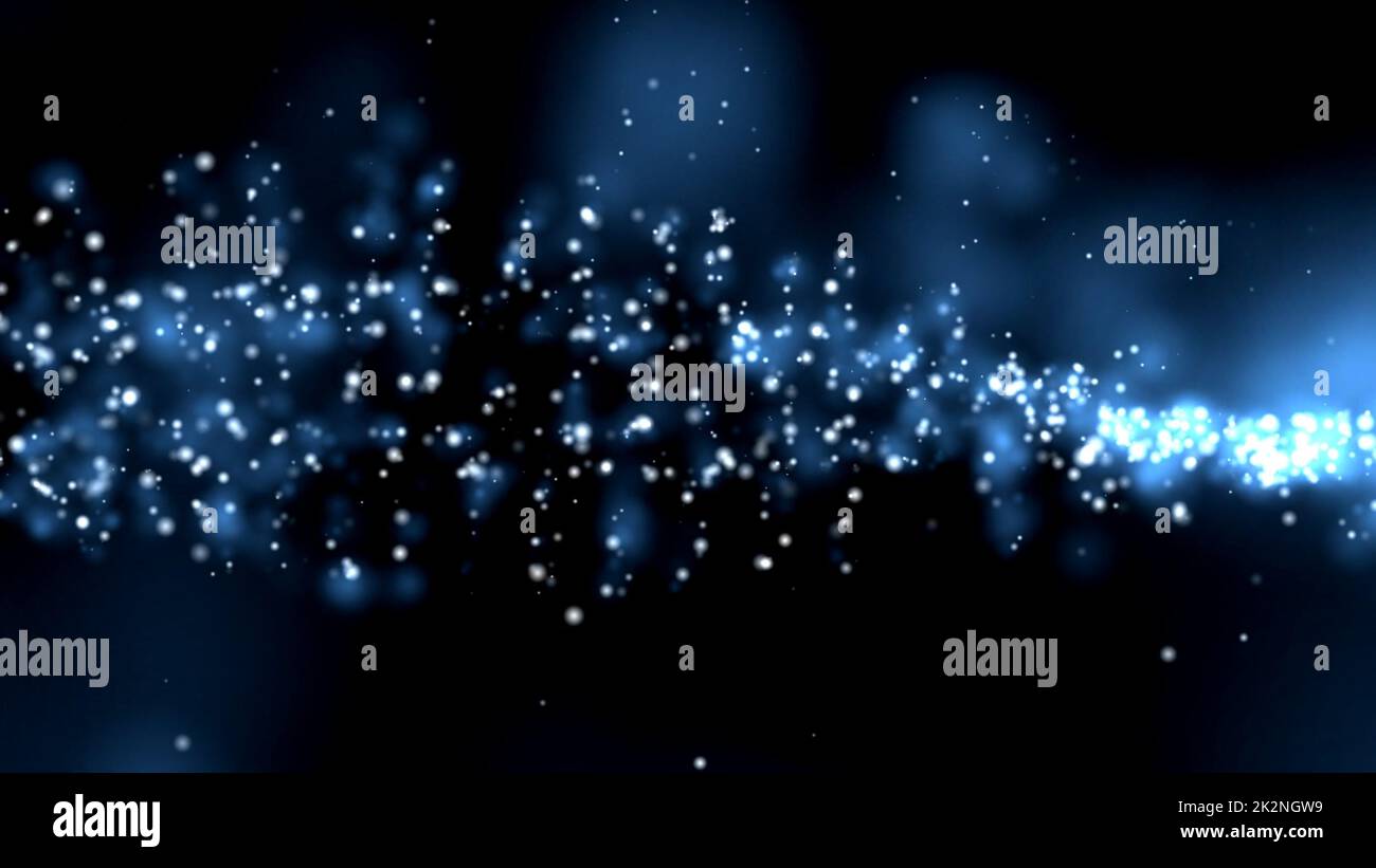 Blue dust particles floating over black Stock Photo - Alamy