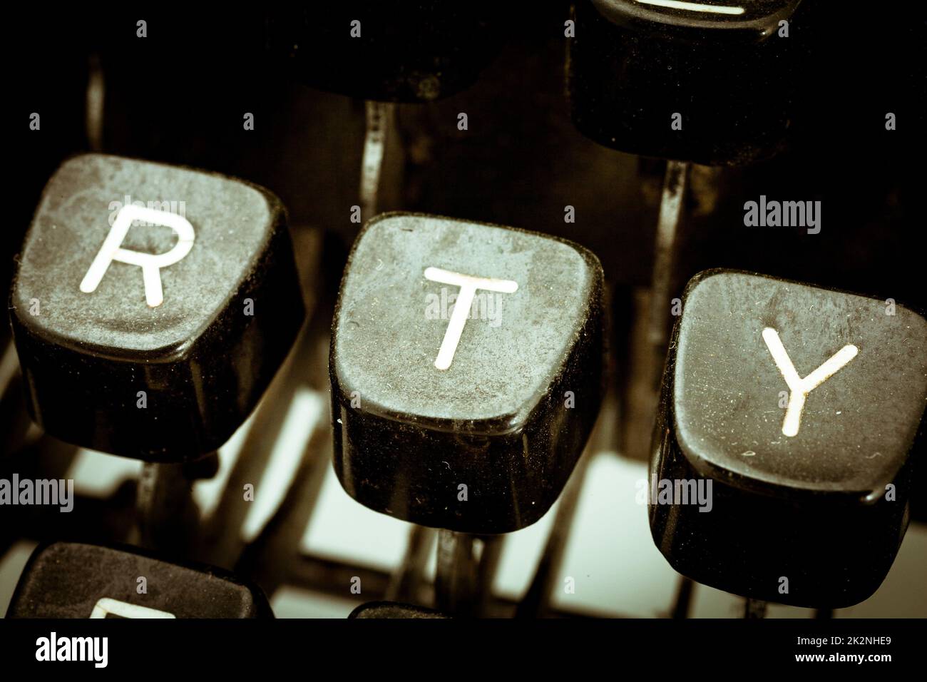 T letter on a vintage typewriter keyboard Stock Photo