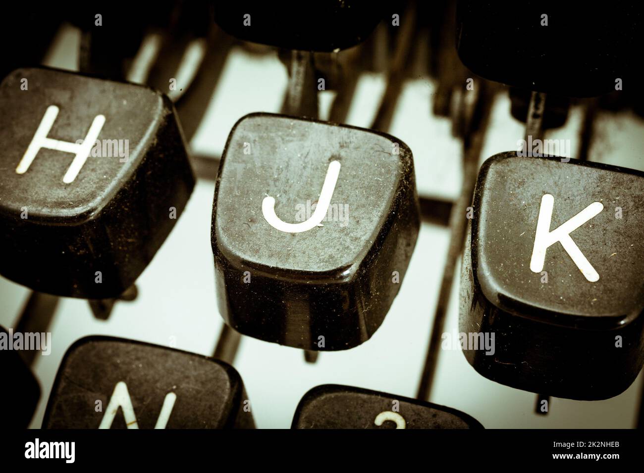 J letter on a vintage typewriter keyboard Stock Photo