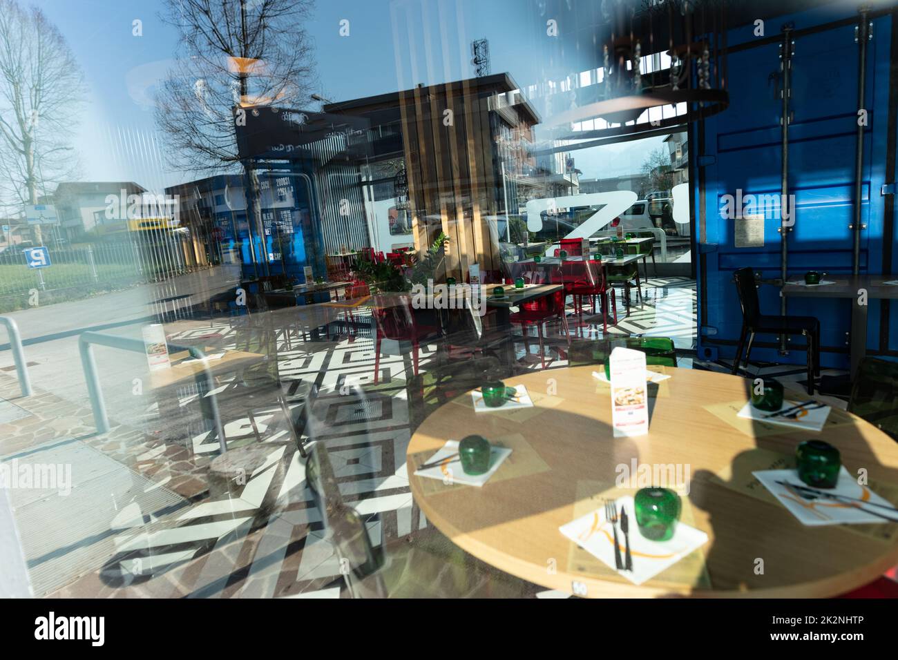 Through window view of closed, empty restaurant Stock Photo