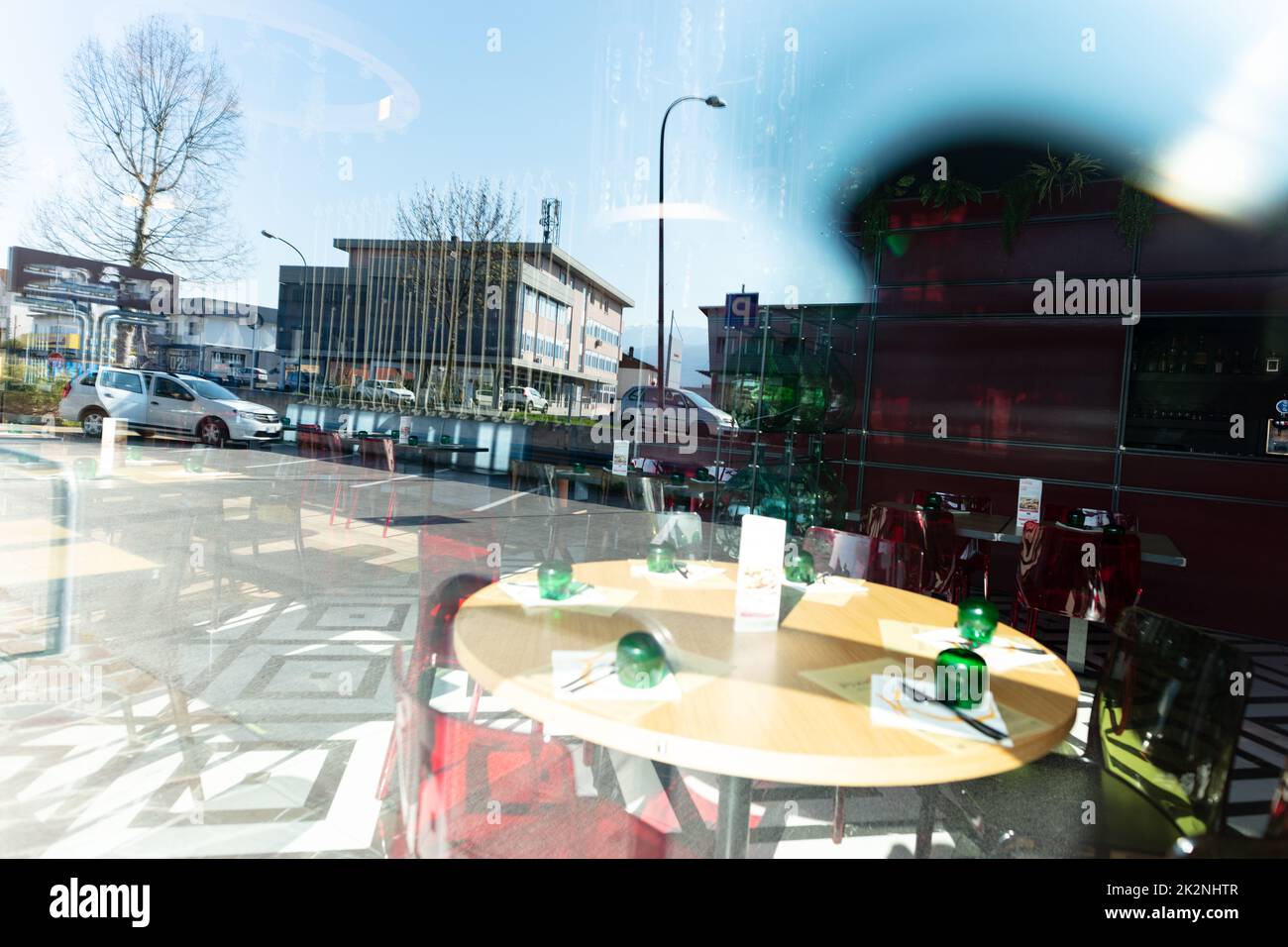 Closed restaurant and window reflection of street Stock Photo