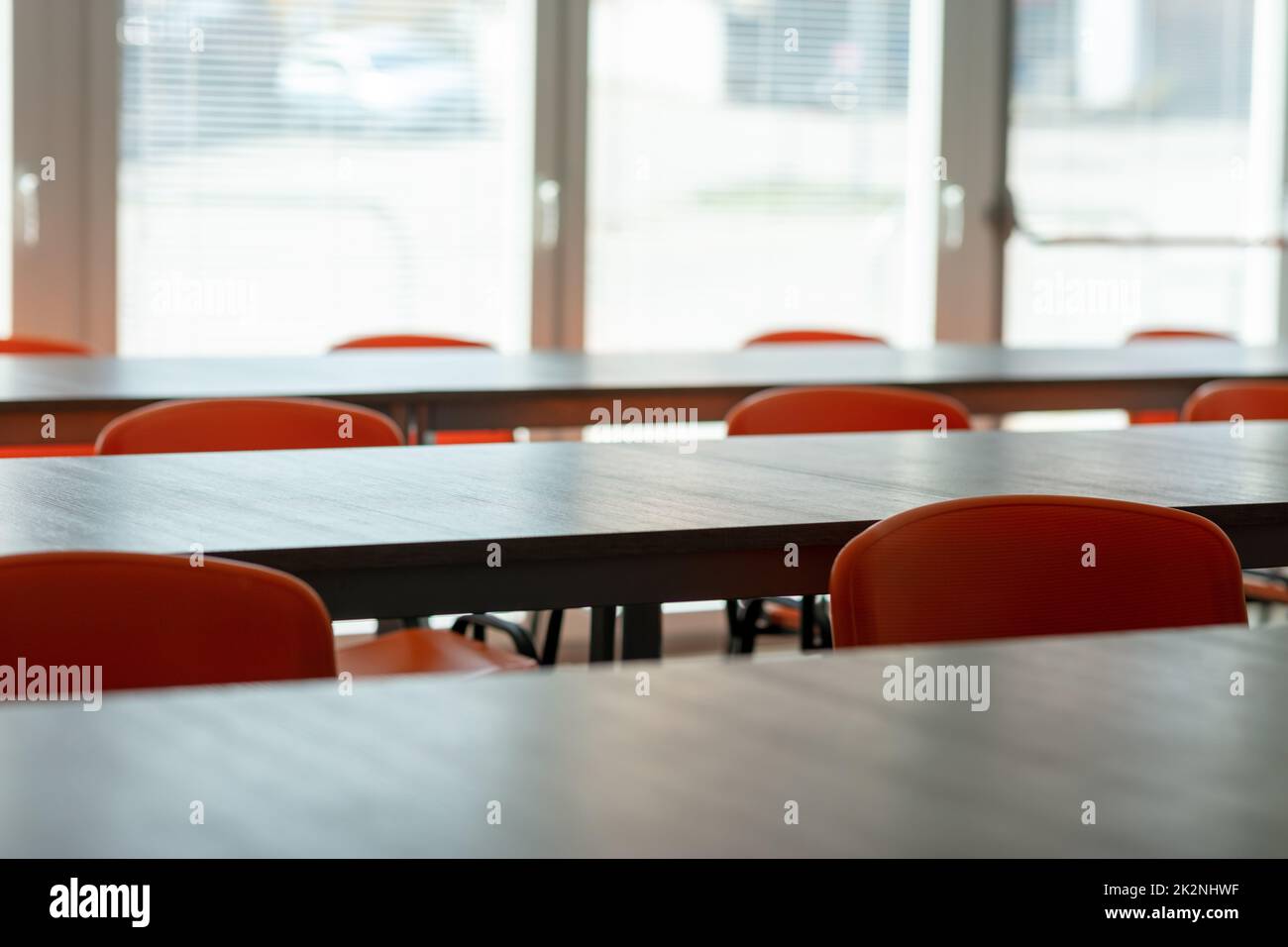 Empty desks and seats during corona virus outbreak Stock Photo