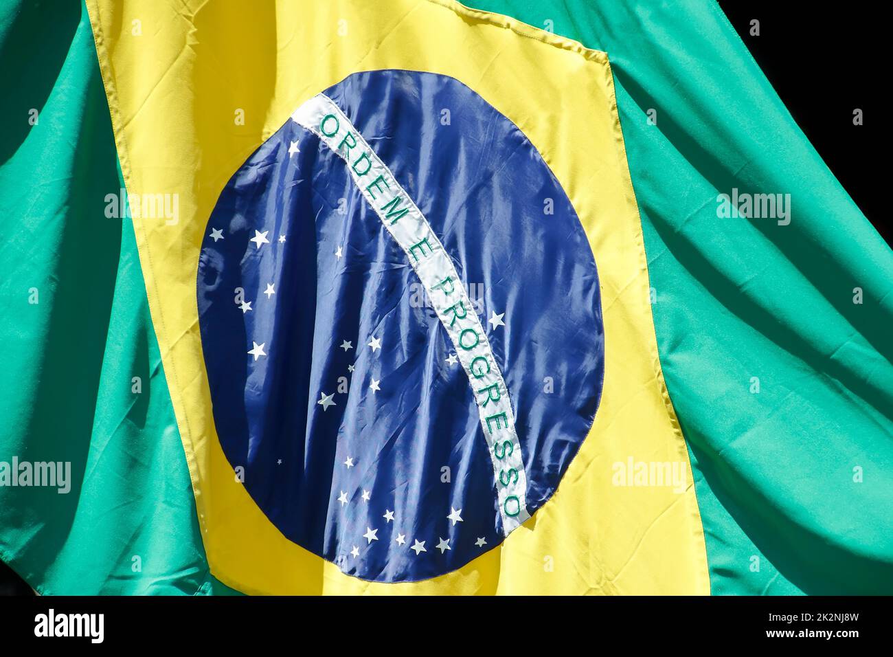Brazilian flag in support and wind - National Pavilion - Brazilian homeland symbol - Brazilian flag fluttering from a flag pole Stock Photo