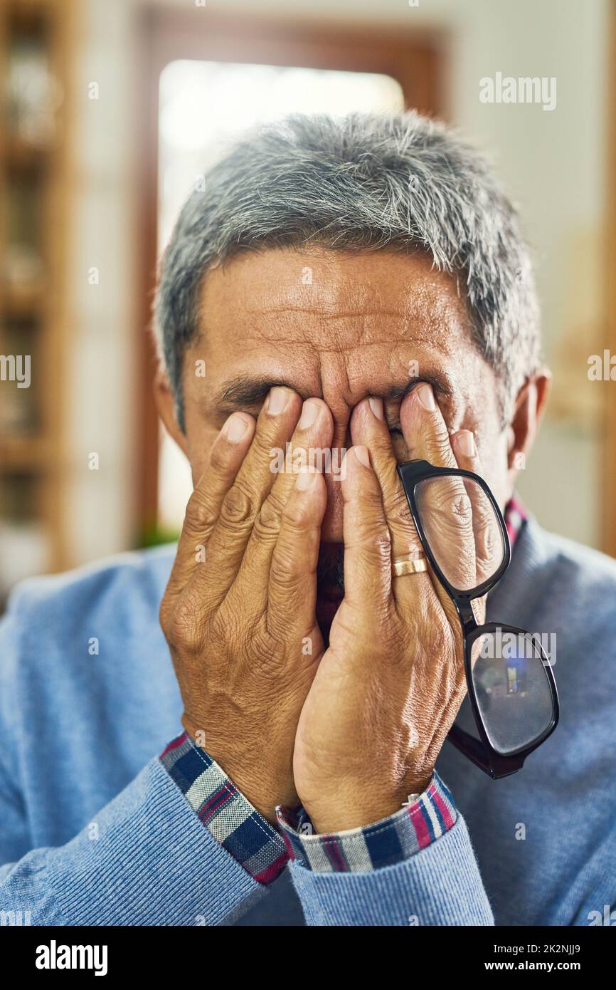 I cant even open my eyes it hurts so bad. Shot of a senior man