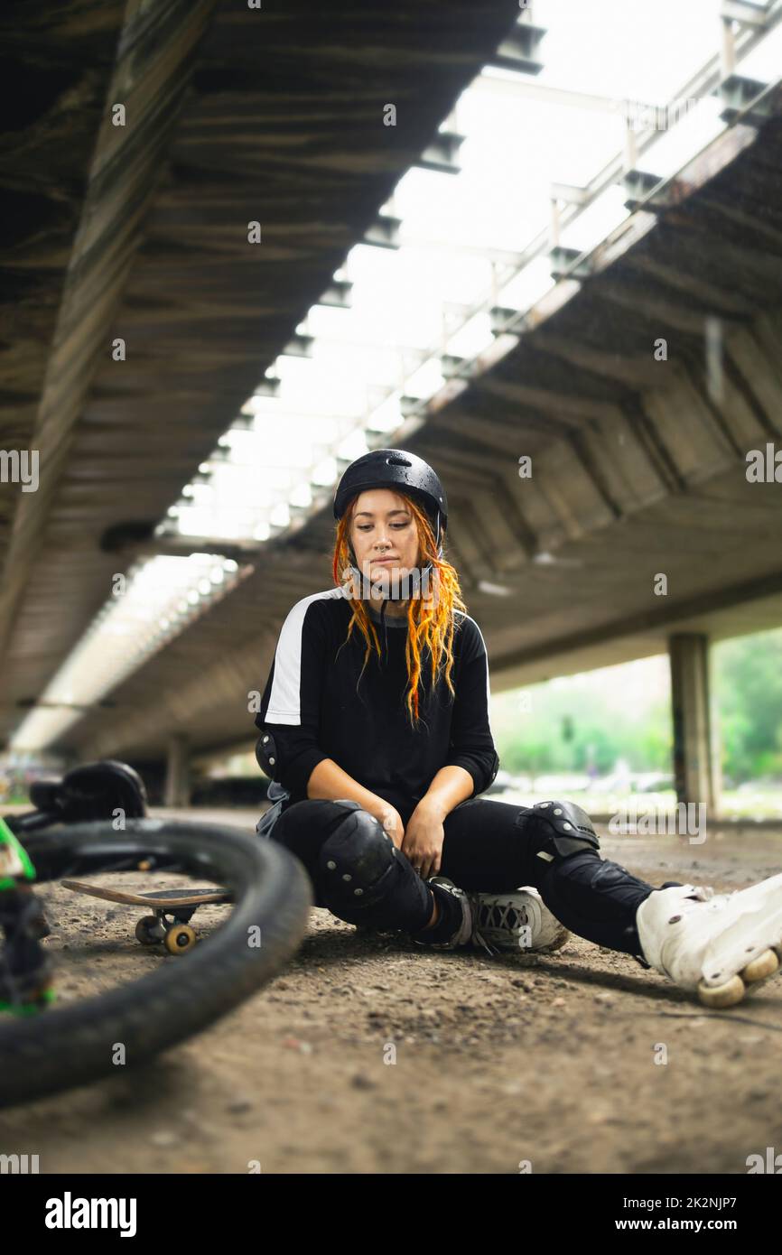 Young active woman wearing protection gear Stock Photo