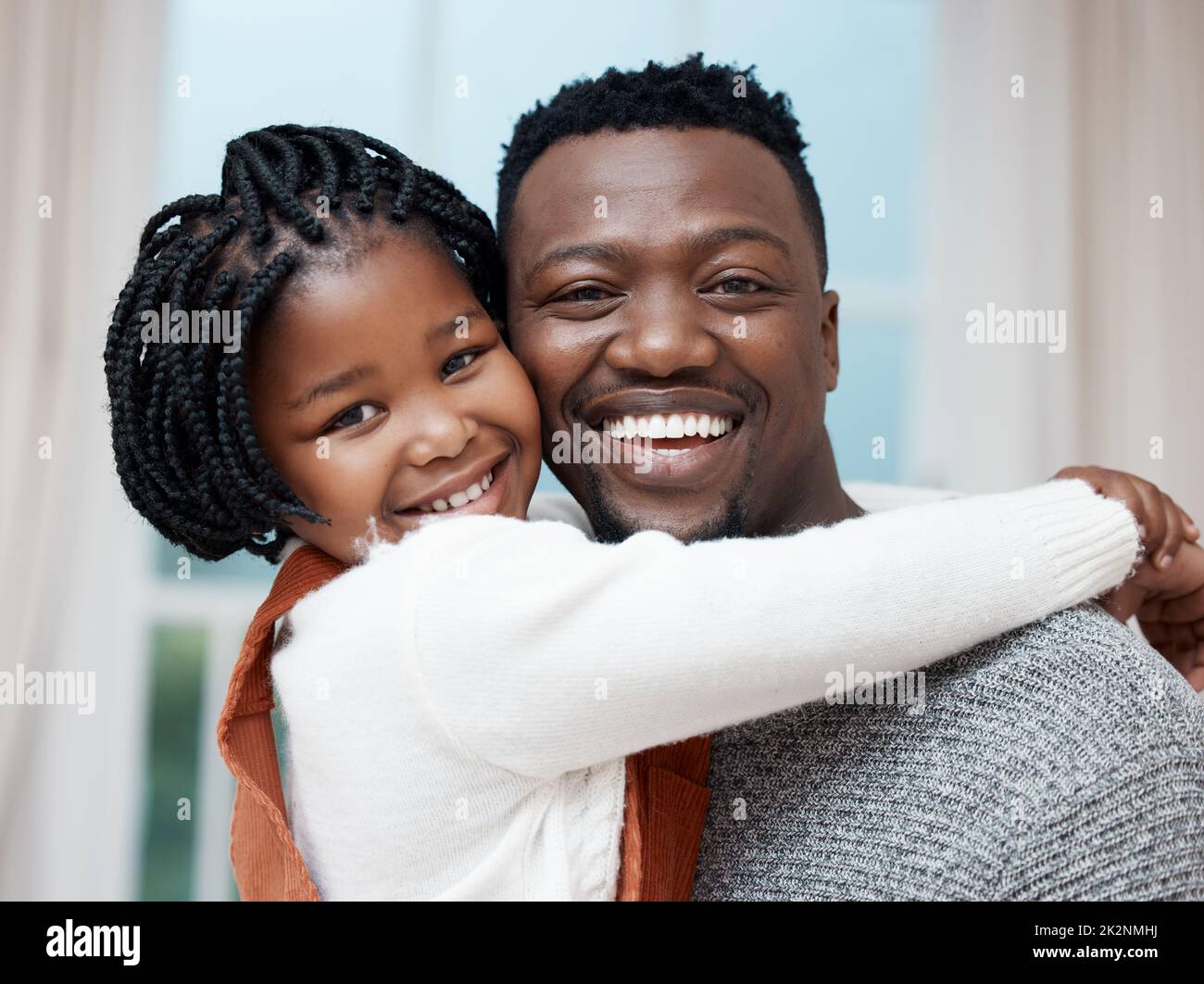 I have the best dad in the world. Shot of a young father hugging his