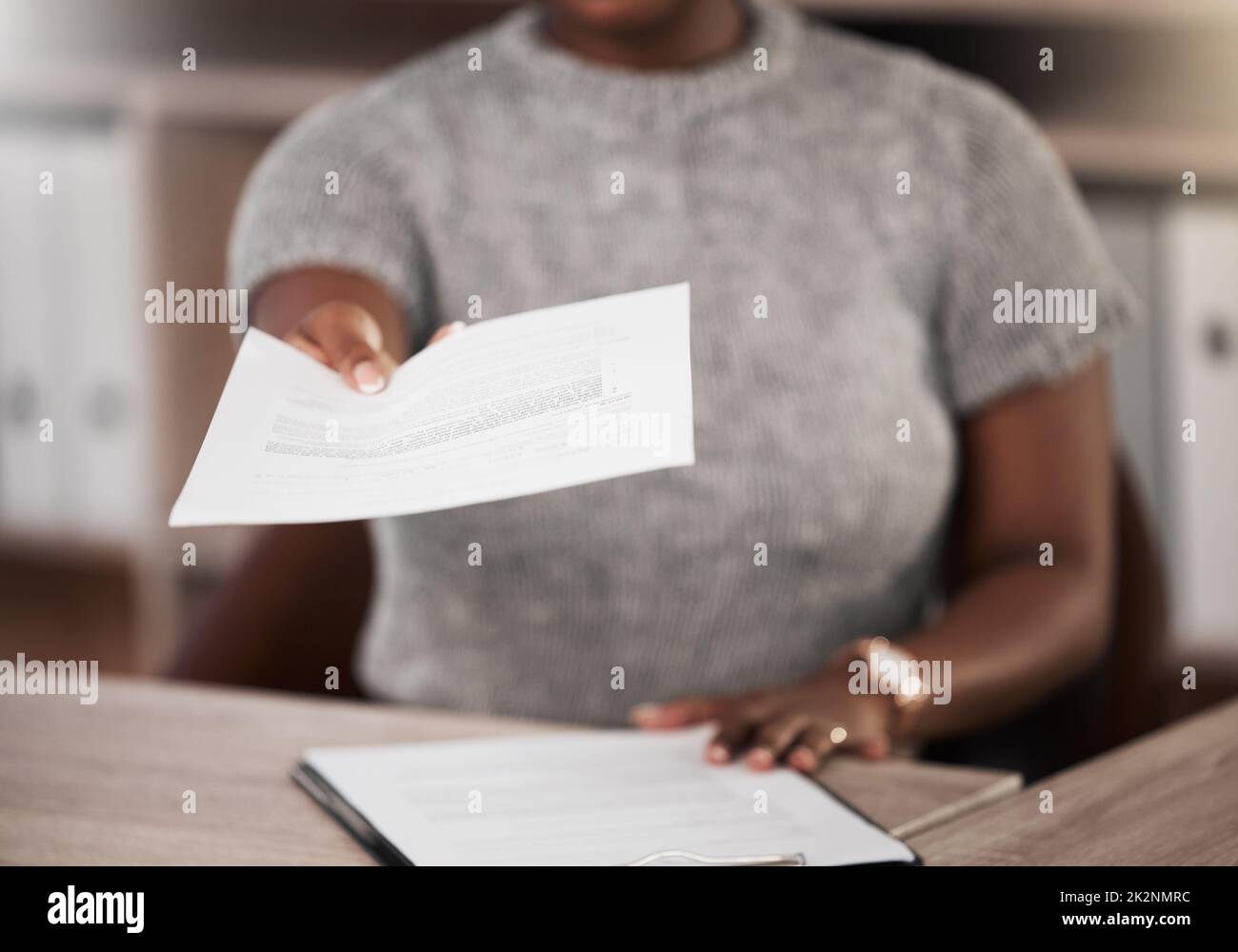 Handing Over Shot Handing a note hi-res stock photography and images - Alamy