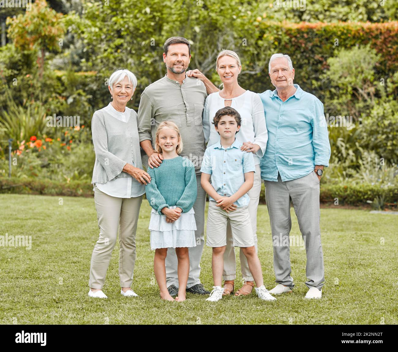 How lucky we are to have each other. Shot of a multi-generational family standing together outside. Stock Photo