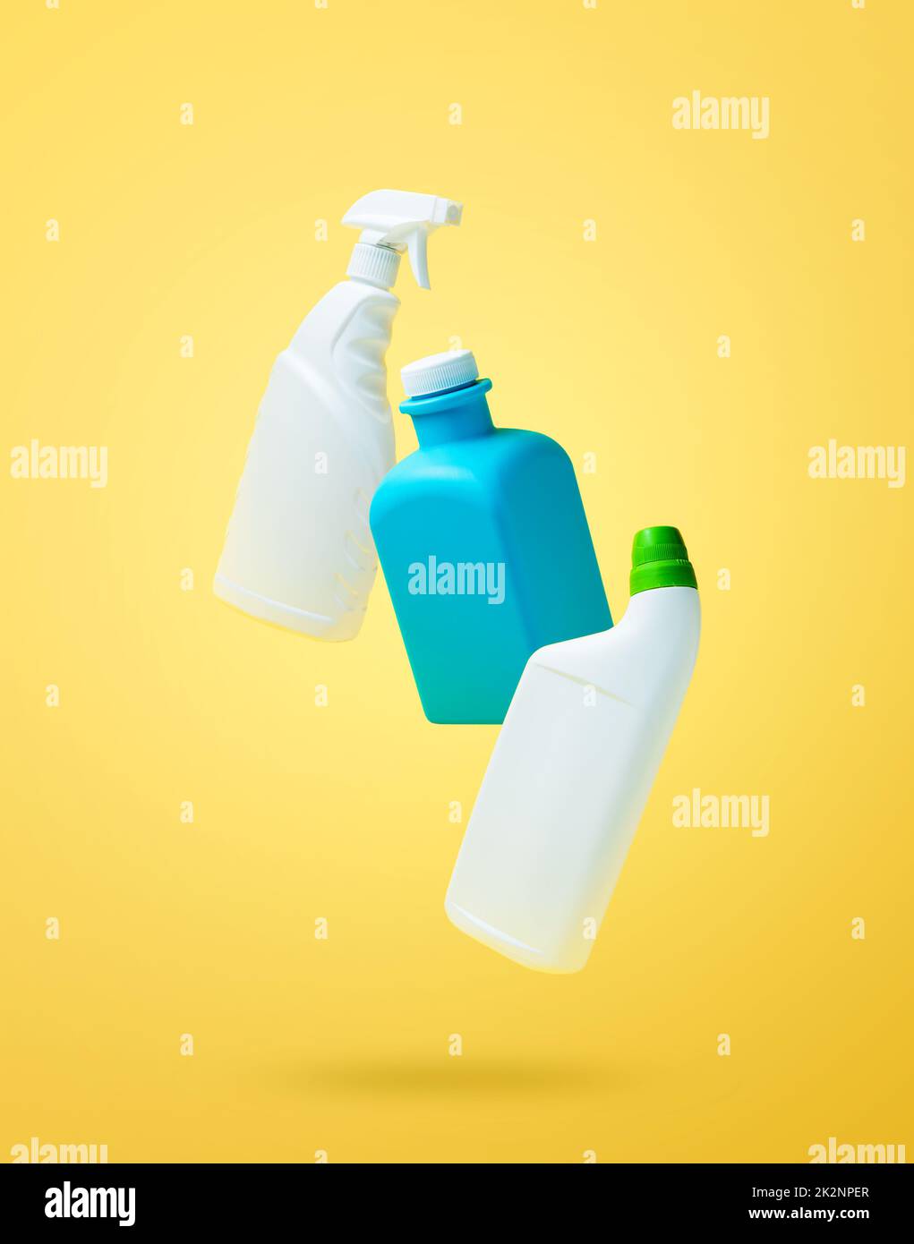 Falling in air blank household chemical bottles for cleaning the house Stock Photo