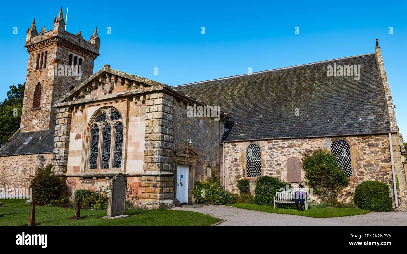 Dirleton, East Lothian, Scotland, UK, 23rd September 2022. Scarecrow Trail: the second trail this year has 18 scarecrows around the village. Pictured: a scarecrow outside the village church. Credit: Sally Anderson/Alamy Live News Stock Photo