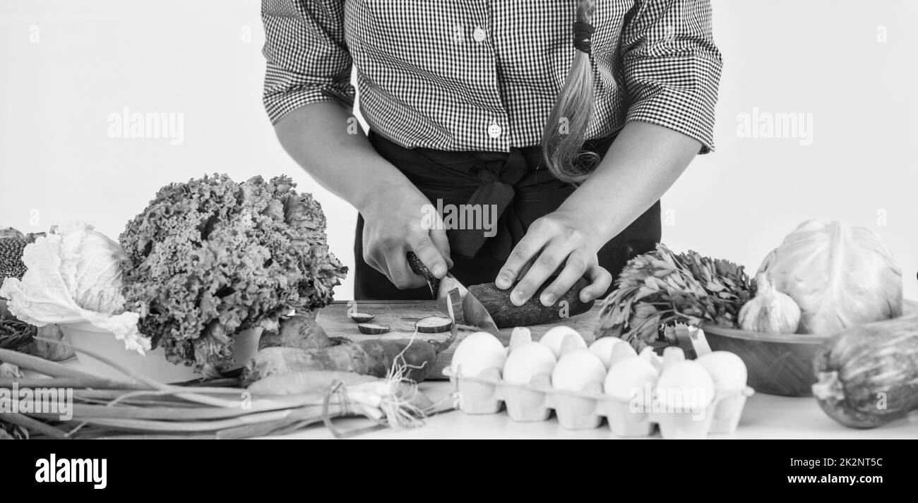 Chef preparing ingredients knife Black and White Stock Photos & Images ...