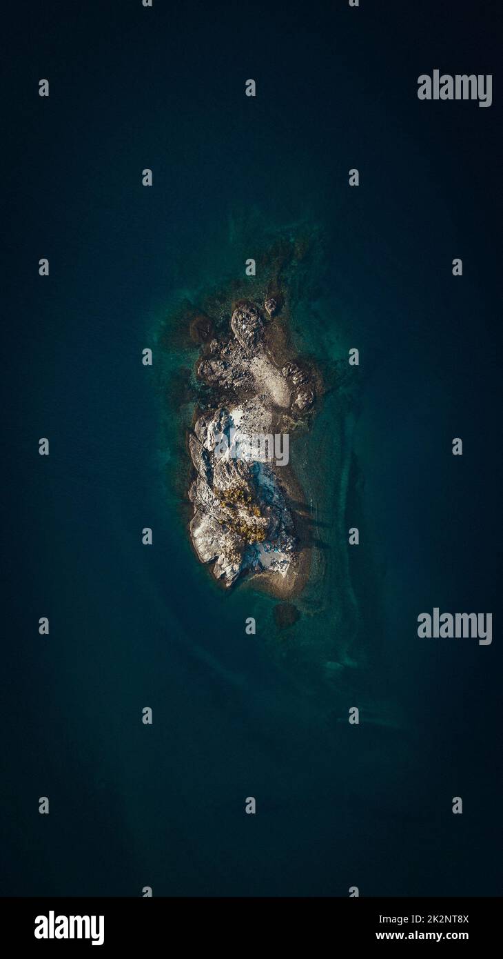 A bird's eye view of a rocky island in the ocean Stock Photo - Alamy