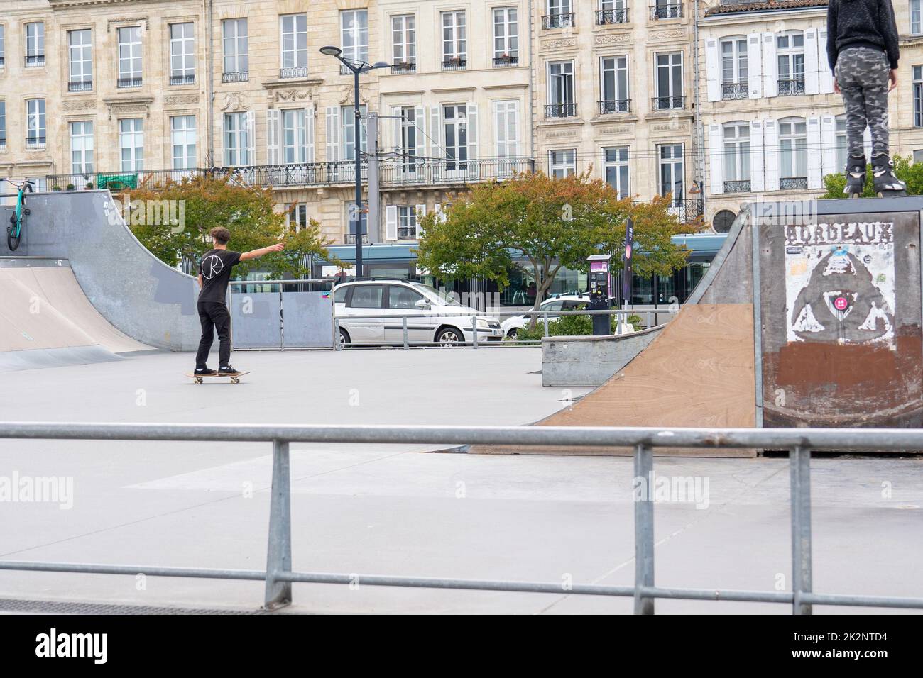 An inline roller blader performing jumps at a local skate park in Bordeaux,  France Stock Photo - Alamy