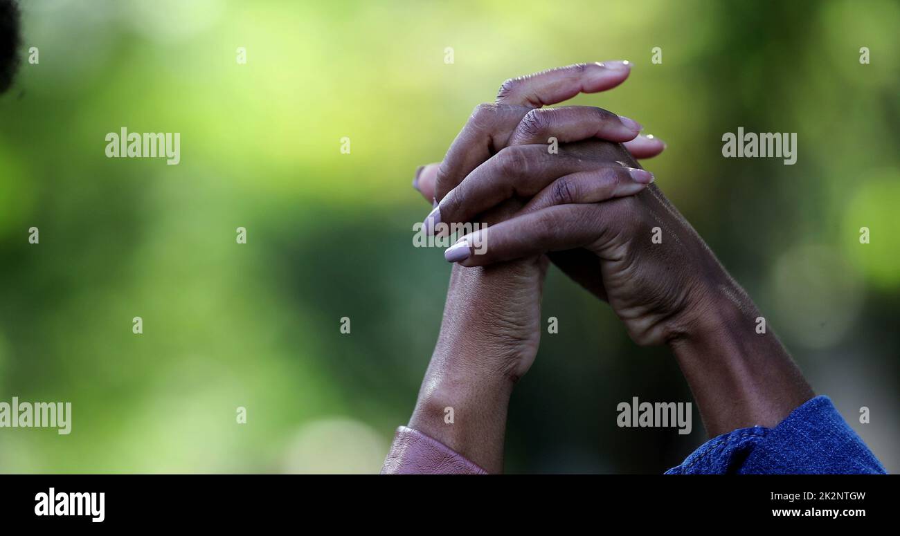 Two black hands joining together in unity Stock Photo Alamy