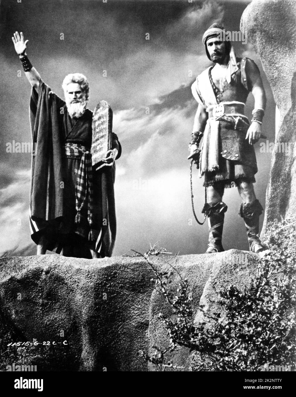 CHARLTON HESTON and JOHN DEREK in THE TEN COMMANDMENTS 1956 director CECIL B. DeMILLE Motion Pictures Associates / Paramount Pictures Stock Photo