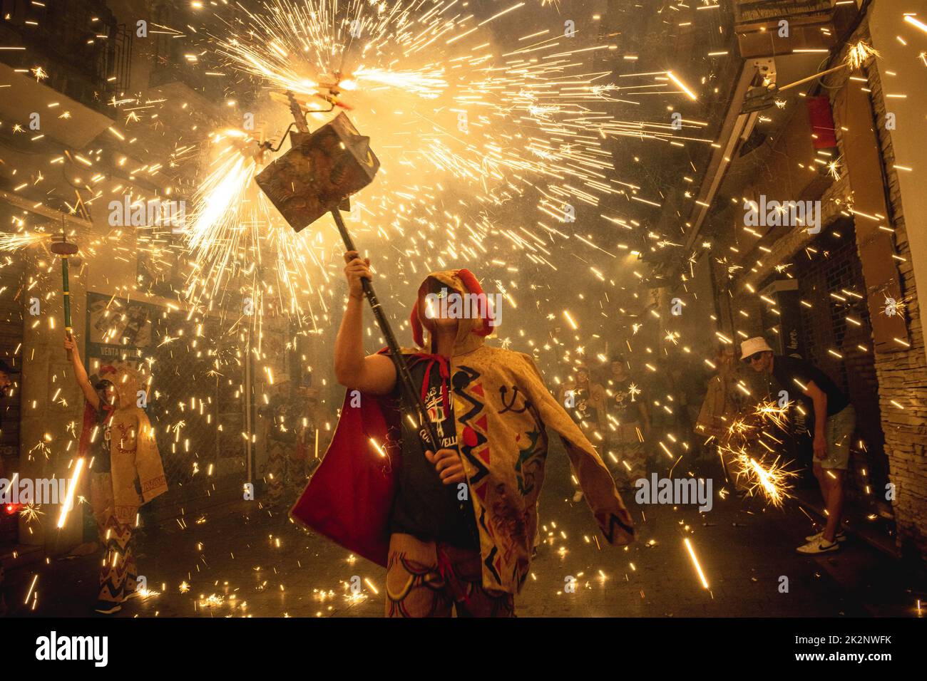 Sitges, Spain. 23rd Sep, 2022. Little devils set off their fireworks during the traditional morning children 'correfoc' at Sitges' Santa Tecla Festival Credit: Matthias Oesterle/Alamy Live News Stock Photo