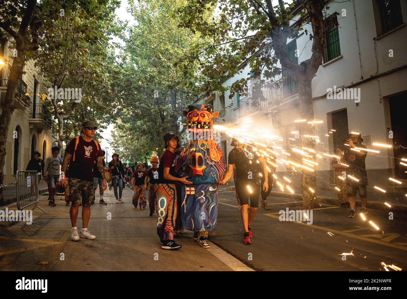 Sitges, Spain. 23rd Sep, 2022. A fire beast sets off his fireworks during the morning children 'correfoc' during Sitges' Santa Tecla Festival Credit: Matthias Oesterle/Alamy Live News Stock Photo