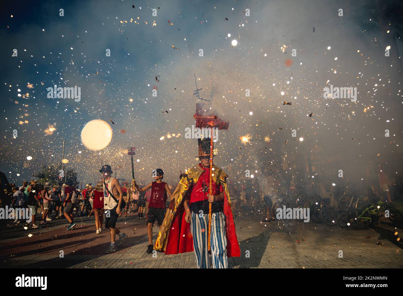 Sitges, Spain. 23rd Sep, 2022. Little devils set off their fireworks during the traditional morning children 'correfoc' at Sitges' Santa Tecla Festival Credit: Matthias Oesterle/Alamy Live News Stock Photo