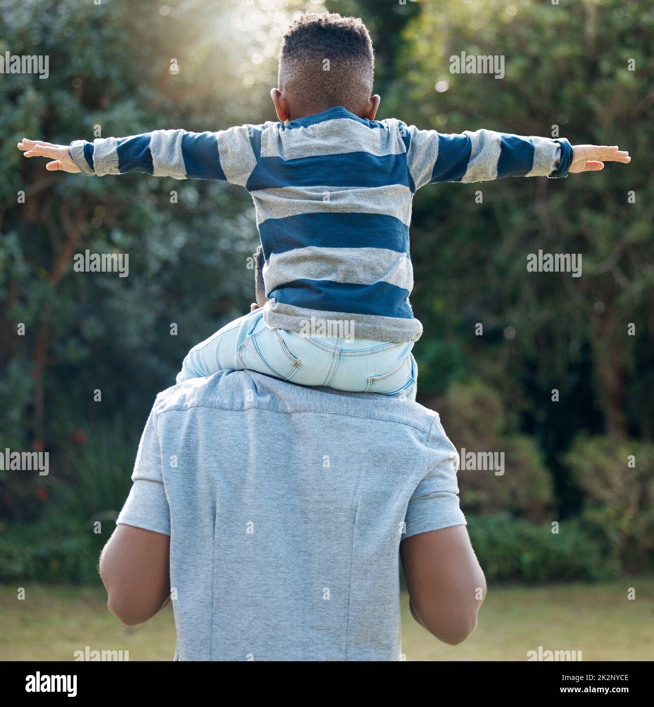 Dad giving son piggyback ride hi-res stock photography and images - Alamy