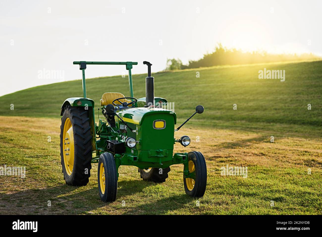 Ready for a good plowing. Shot of a tractor on an open piece of land