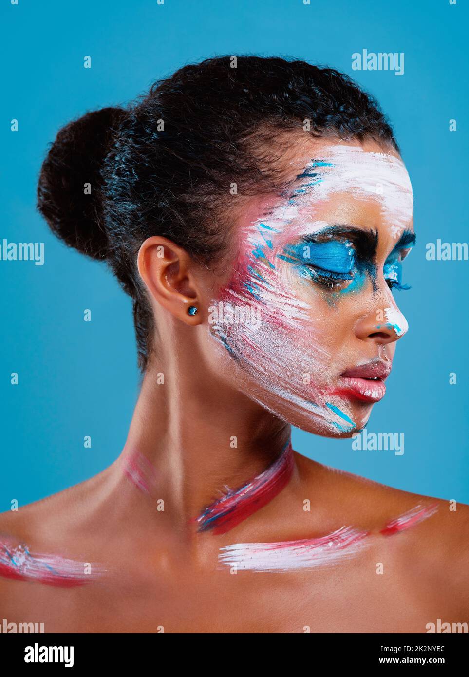 Portrait of a woman who is posing covered with blue paint Stock Photo by  ©vova130555@gmail.com 79436824