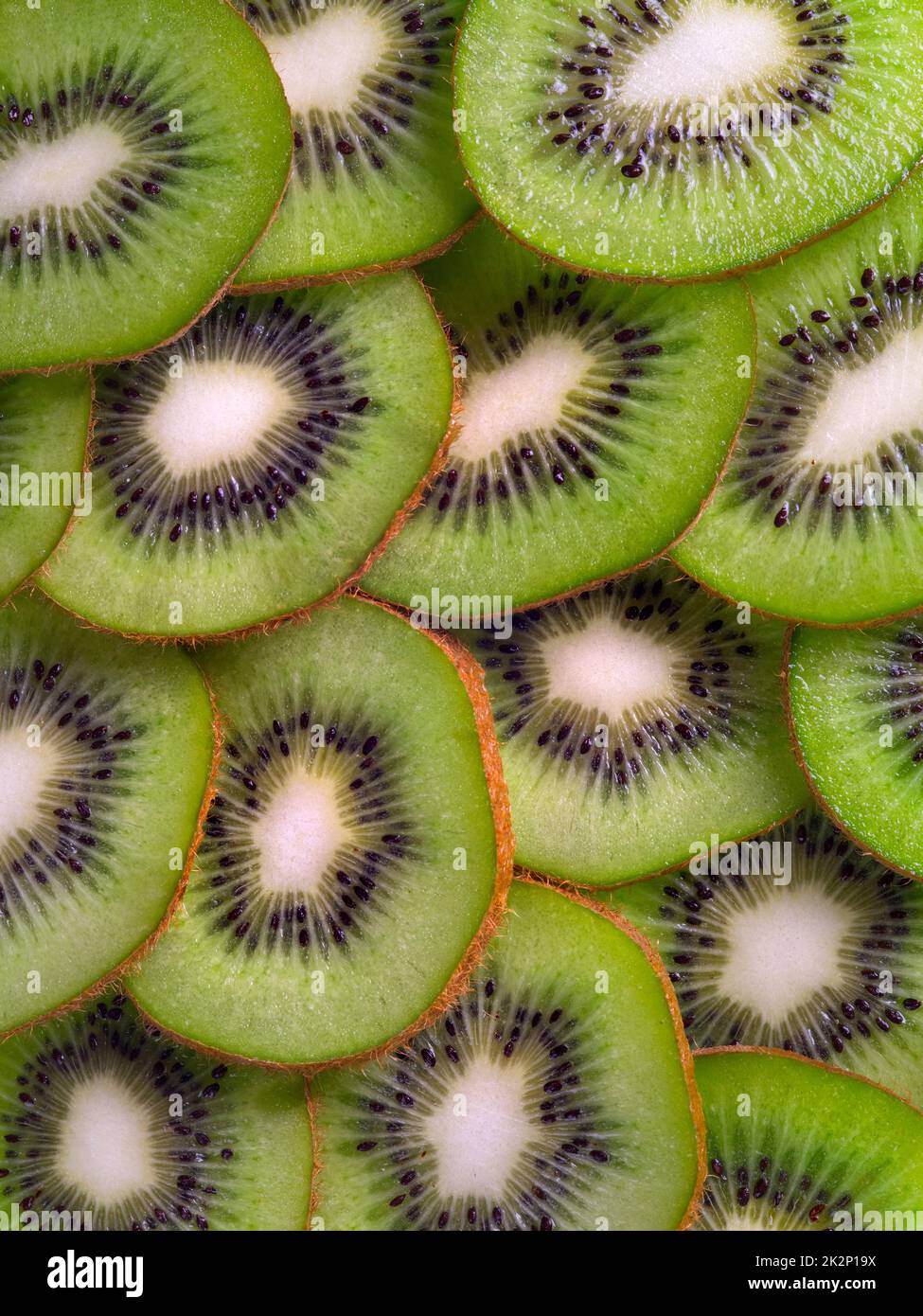 Sliced Kiwi fruit background Stock Photo